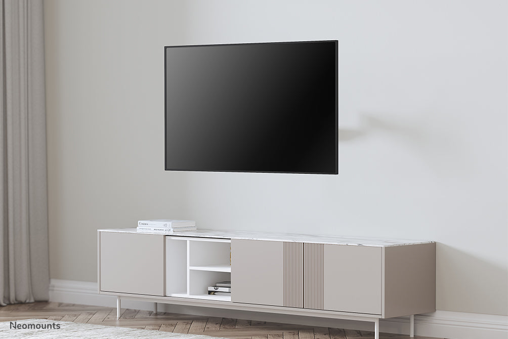 Neomounts WL70-550BL14 Support mural pour écran 32-55" - ressort à gaz - orientable